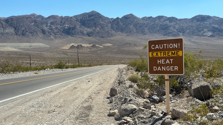 A sign is warning of extreme heat in Death Valley