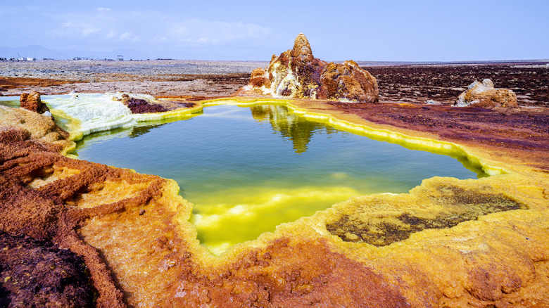 A sulphur acid pond is colorful at the Danakil Depression