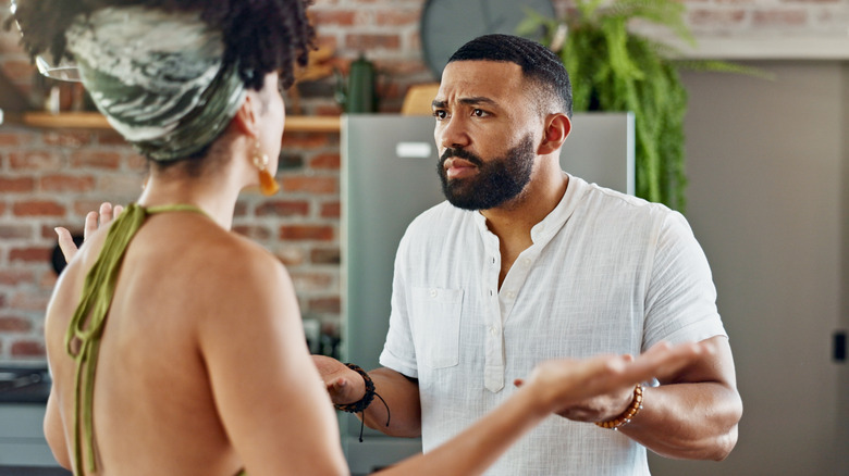 Couple arguing and looking frustrated