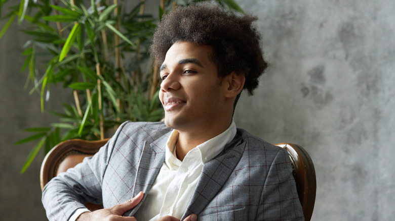 Young confident male smiling