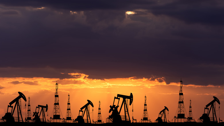 Oil field silhouette at sunset