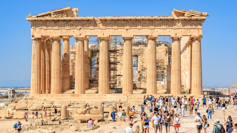 A crowd exploring the Parthenon in Athens, Greece