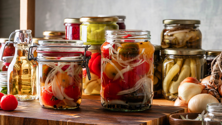 Closed jars filled with fermenting vegetables