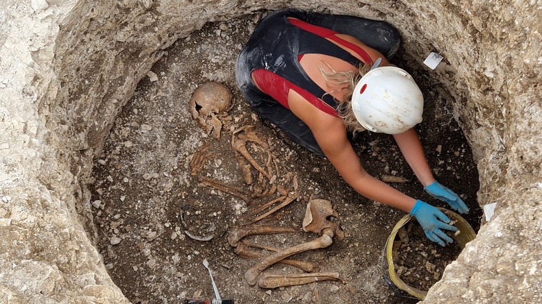 BU staff/student working in a burial pit from the Iron Age in Dorset, England