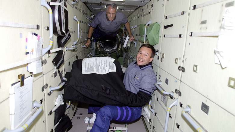 Two crew members on board the ISS