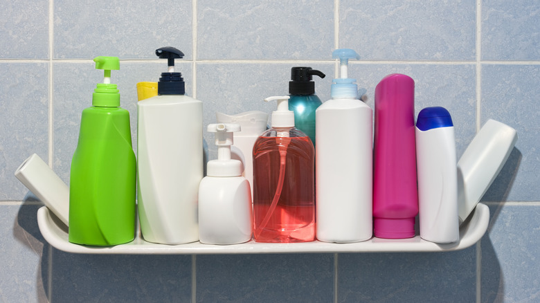 An assortment of bottles in a shower on Earth