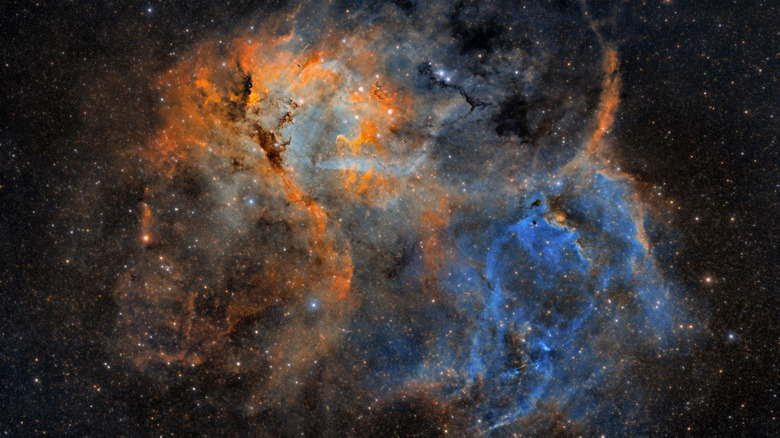 Orange and blue lion nebula supernova remnant