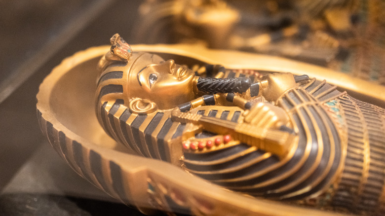 Gold and black Egyptian sarcophagus