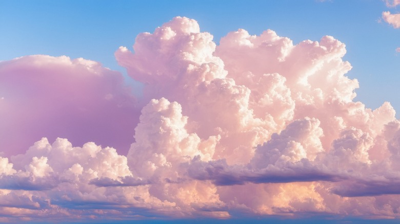 ground view of cumulus clouds at dusk or dawn