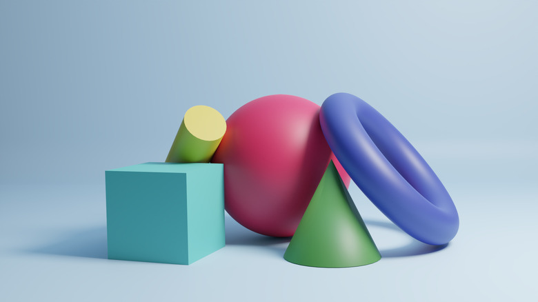 Colorful, three-dimensional shapes against light blue background