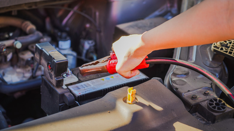 Selective focus charging car with electricity through cables, Car Preventive Maintenance.