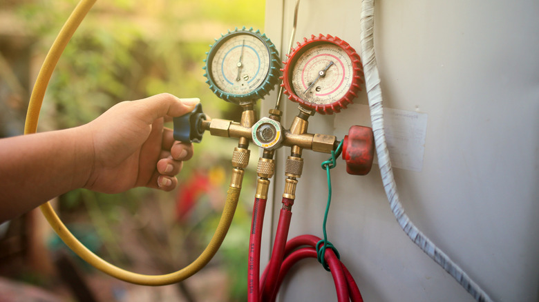 Tubes and meter on air conditioning unit