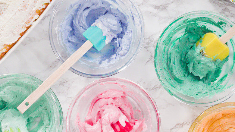 Frosting with food coloring mixed through