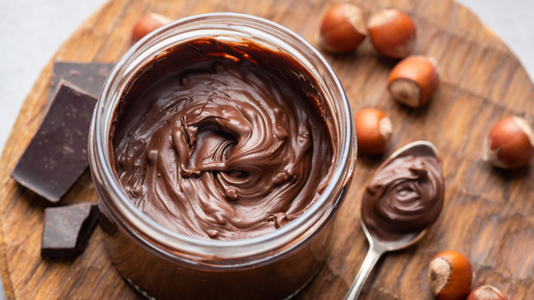 Chocolate hazelnut spread in a glass jar