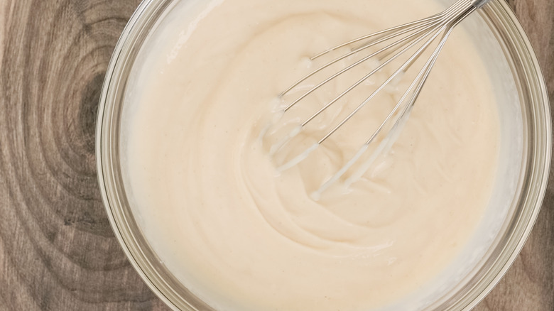 Bowl of instant pudding and whisk