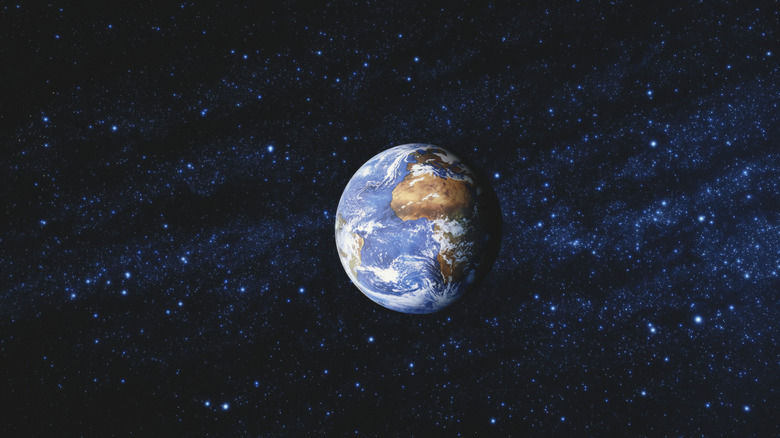 Rendering of planet Earth in starry space