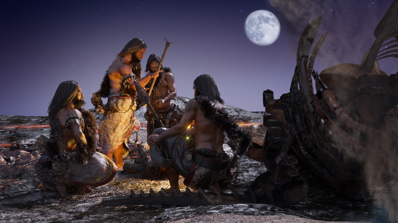 neanderthals at night around a fire under a full moon