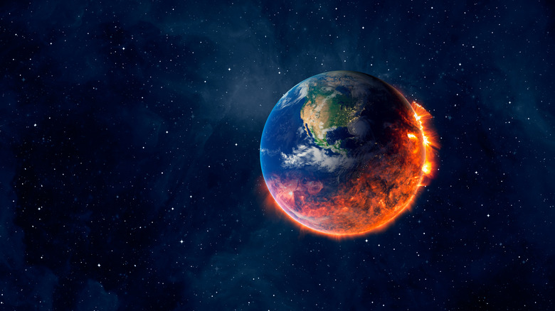 The planet Earth consumed by flames in artist's rendition