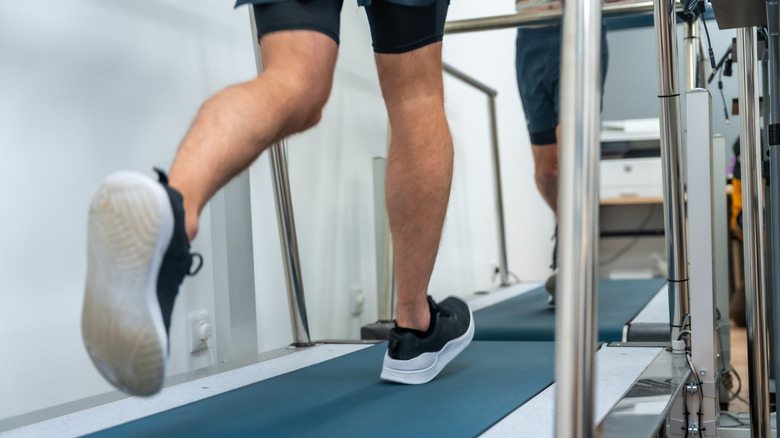 A patient running on a treadmill