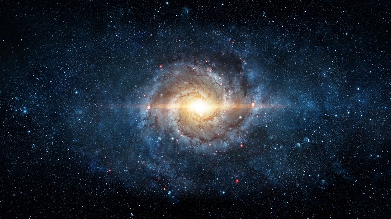 Illustration of a spiral galaxy with bright light in center