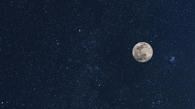 full Moon photographed in starry sky