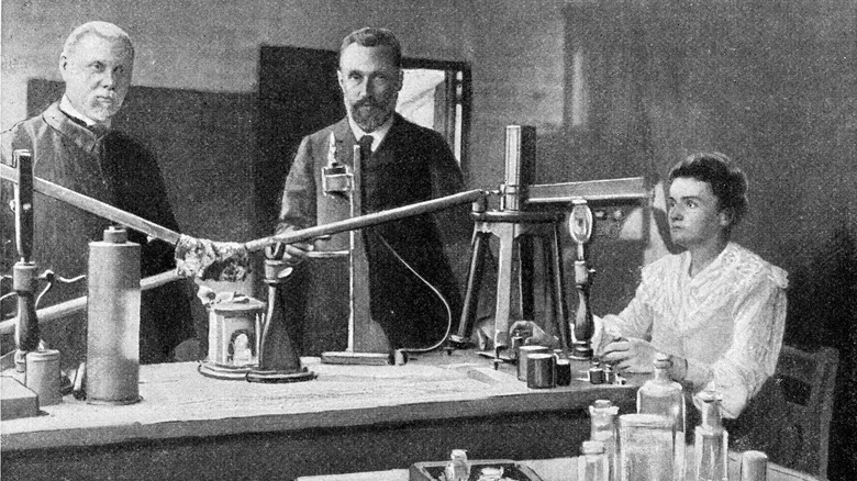 Marie and Pierre Curie in a lab