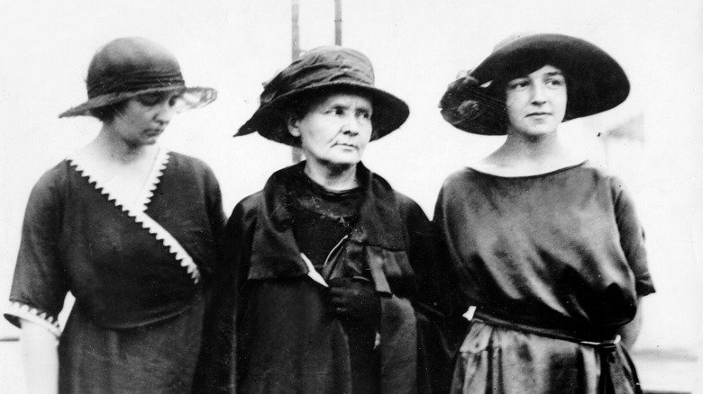 Marie Curie with her daughters Irene and Eve in 1921