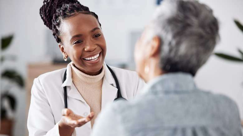 Doctor talking with a patient