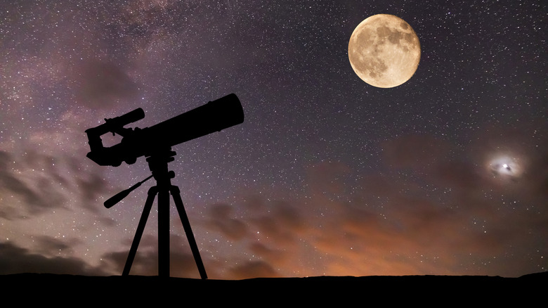 A telescope pointed towards the moon