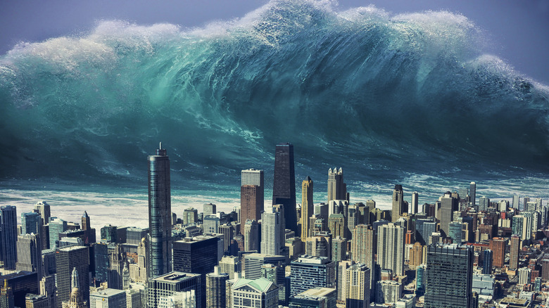 Computer-generated depiction of tsunami towering over a city