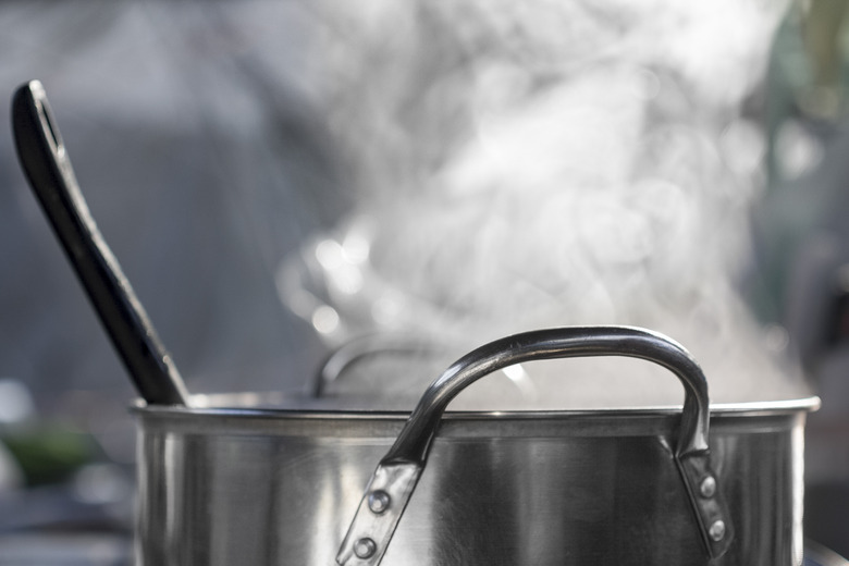 steam on pot in kitchen