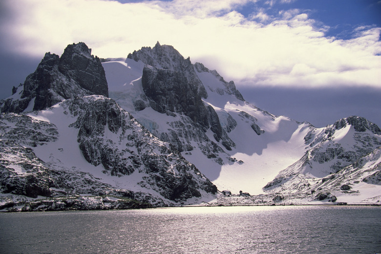 Snow covered mountain peaks in Antarctica