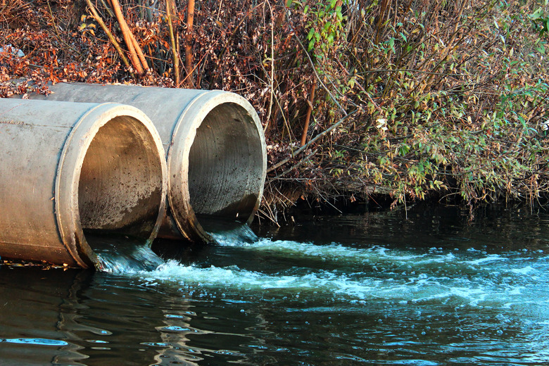 Discharge of sewage into a river