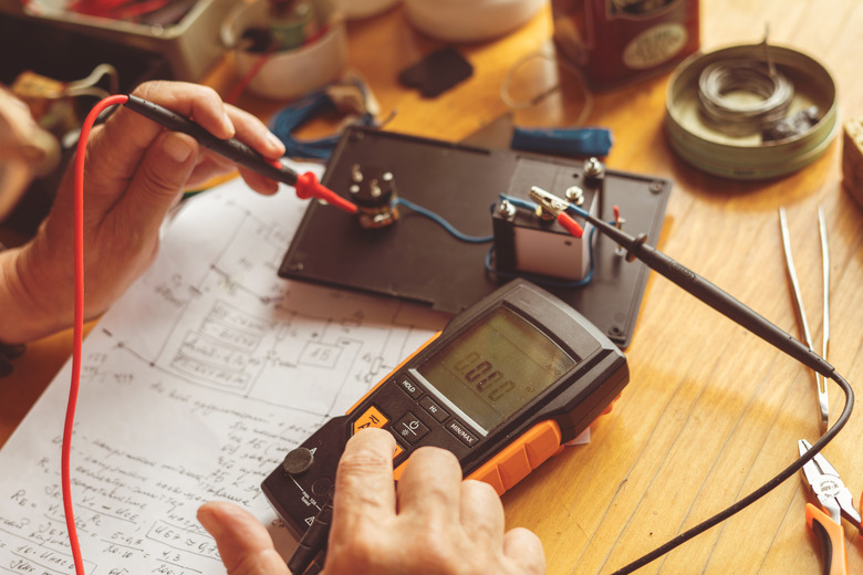 process of making electrical measurements with multimeter, testing the equipment