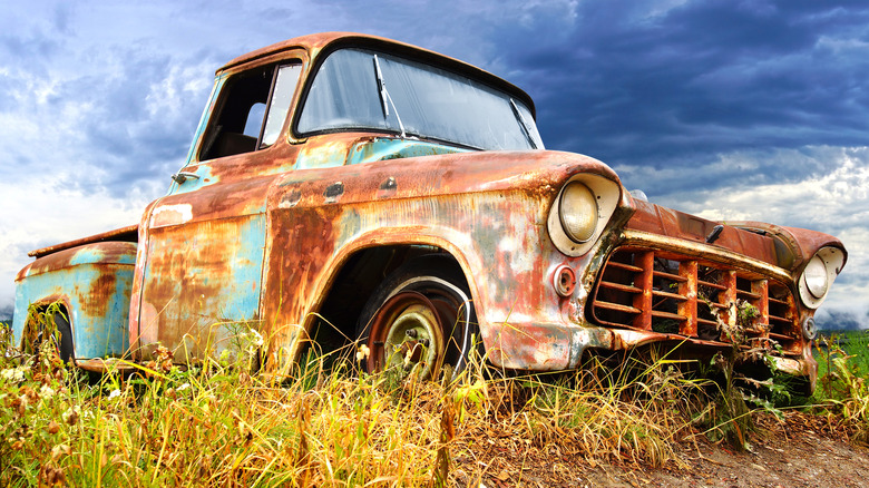 Close up of rusty vintage car.