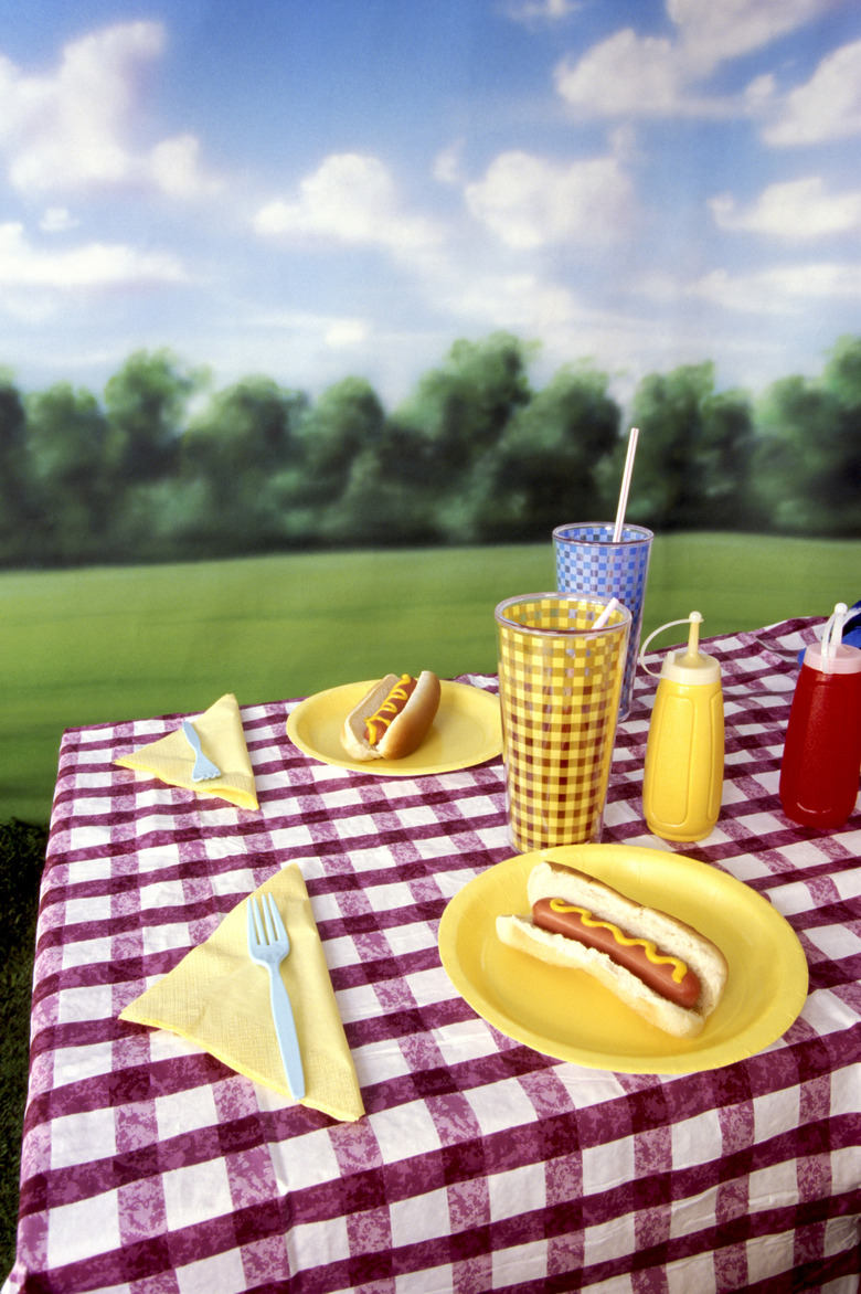 Hot dogs on picnic table