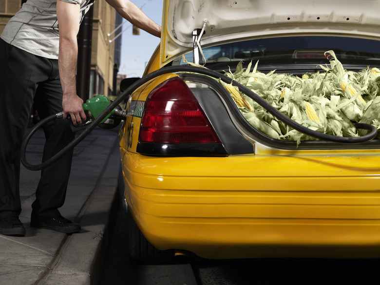 taxi driver filling up with corn fuel