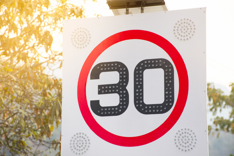 Round Red Road Sign 30 km.