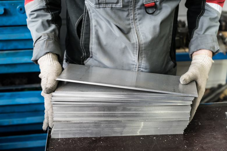 small stack of steel plates on the bench miller