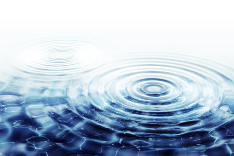 crystal clear water ripples - two perfect concentric circles