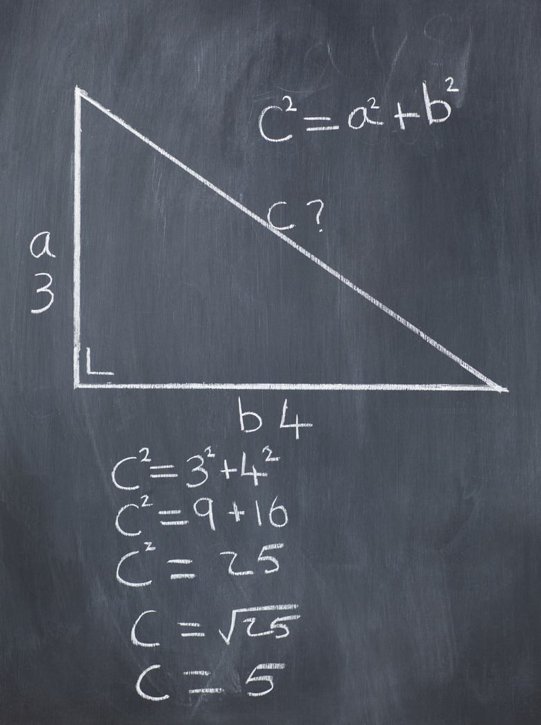 Right-angled  triangle with pythagorean formula and calculations on a blackboard