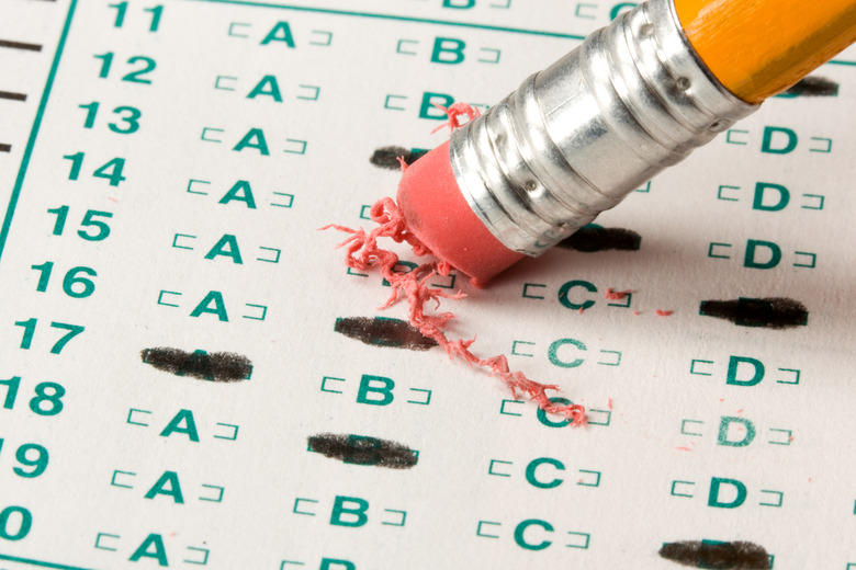 A pencil eraser removing a bubble choice on a test form