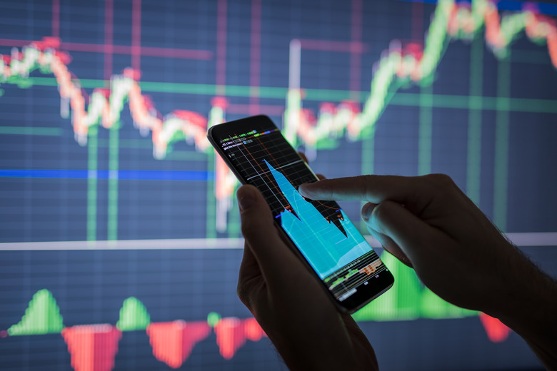 Businessman checking stock market data.