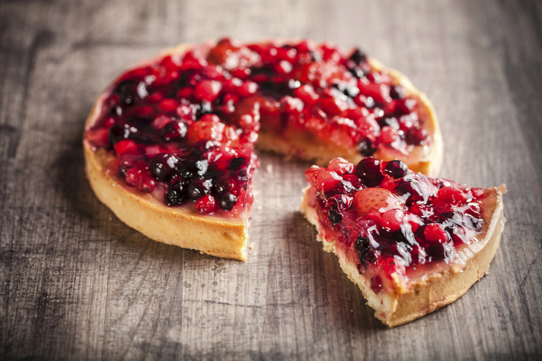 delicious cake on wooden background