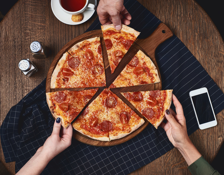 Flatlay. Friends eat pizza