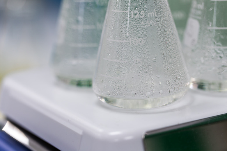 Experiment chemical solution mixing liquids on a Hotplate Stirrer in Lab.