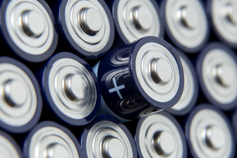 Composition with alkaline batteries