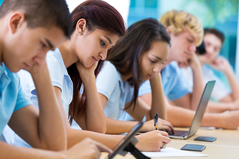 Private school students work in class