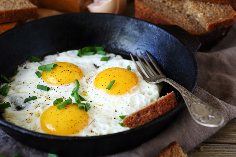 Hot fried eggs in a pan