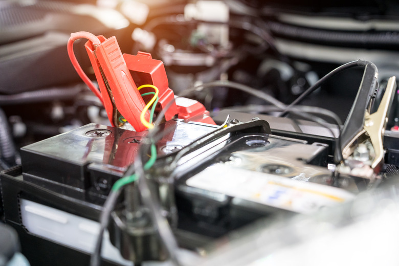 Selective focus charging car with electricity through cables, Car Preventive Maintenance.